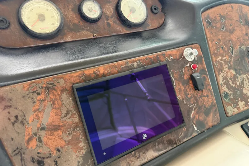 Slide: The Image of Dashboard of 2003 Cruisers Yachts 405 Express Motoryacht with gauges and control panel. - 15