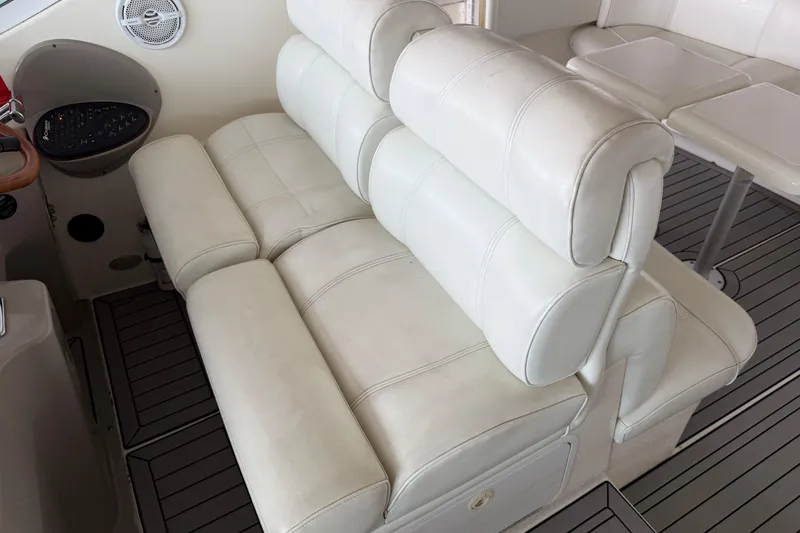 Slide: The Image of Luxurious white seating on 2003 Cruisers Yachts 405 Express Motoryacht interior. - 19