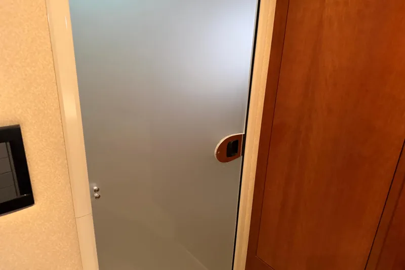 Slide: The Image of Frosted glass door inside 2003 Cruisers Yachts 405 Express Motoryacht cabin. - 43
