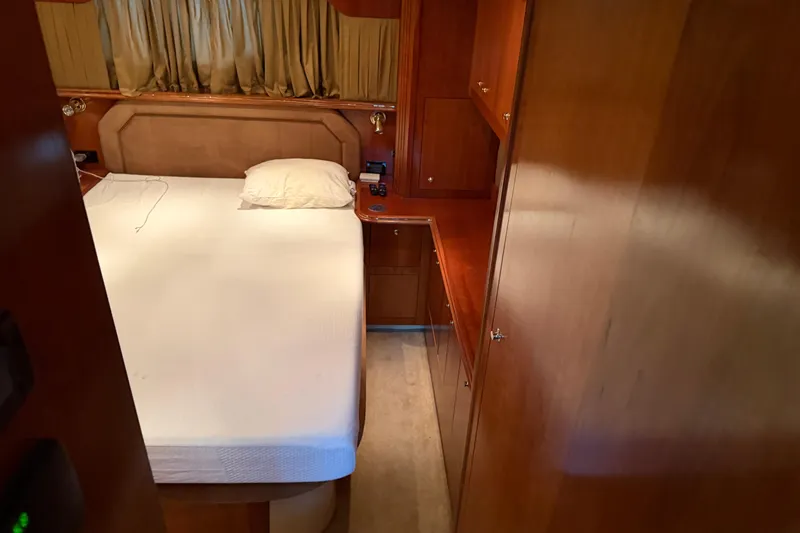 Slide: The Image of Luxurious cabin interior of 2003 Cruisers Yachts 405 Express Motoryacht with wood finish. - 51
