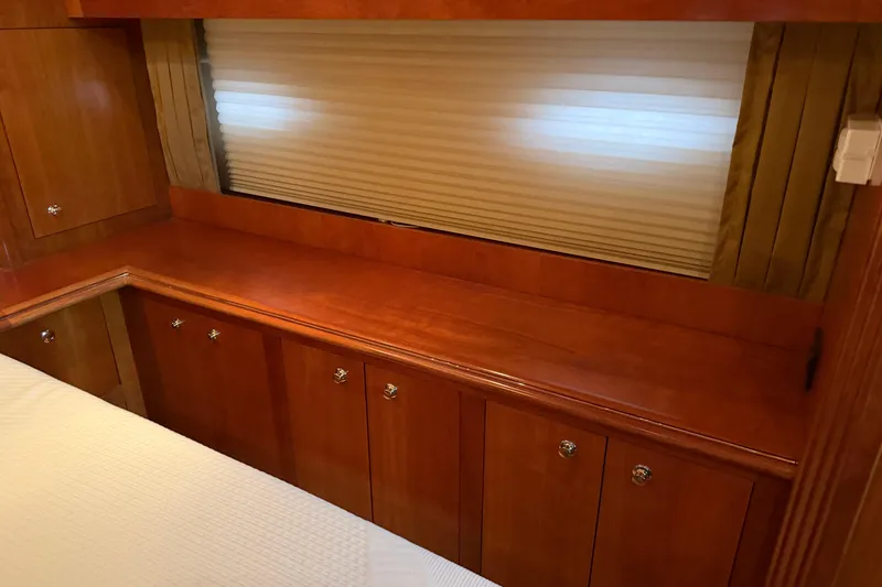 Slide: The Image of Luxurious wood cabinetry in 2003 Cruisers Yachts 405 Express Motoryacht interior cabin. - 53