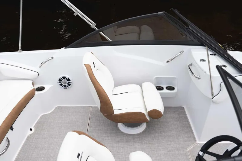 Slide: The Image of Manufacturer Provided Image: Interior of 2026 Stingray 191 DC boat with white and brown seating. - 7