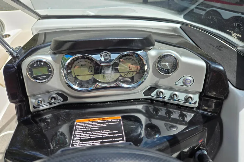 Slide: The Image of Dashboard of a 2011 Sea-Doo Sport Boats 180 Challenger SE with gauges and controls. - 14