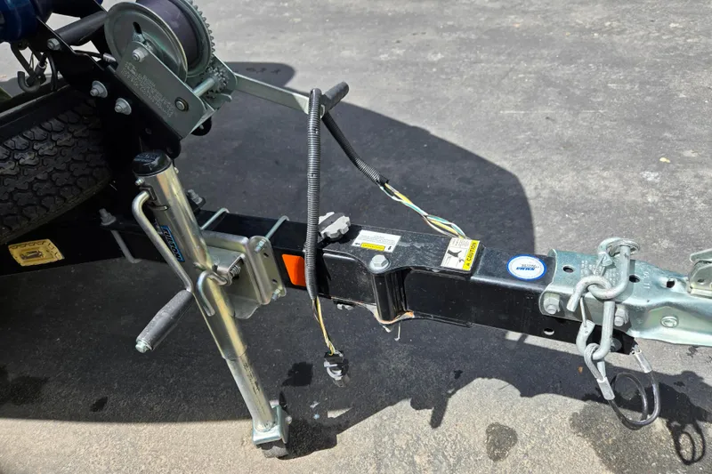 Slide: The Image of Trailer hitch and winch of 2011 Sea-Doo Sport Boats 180 Challenger SE on pavement. - 6