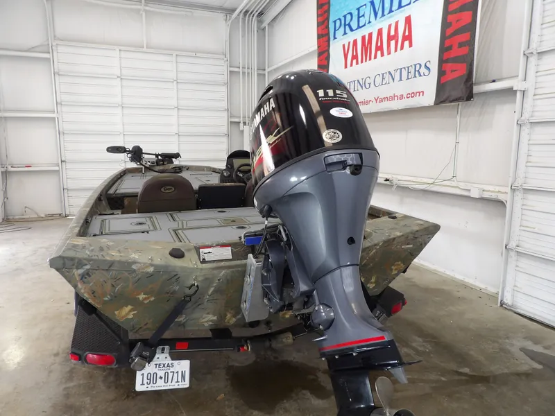 Slide: The Image of 2018 Ranger RT188 boat with Yamaha outboard motor in warehouse. - 17