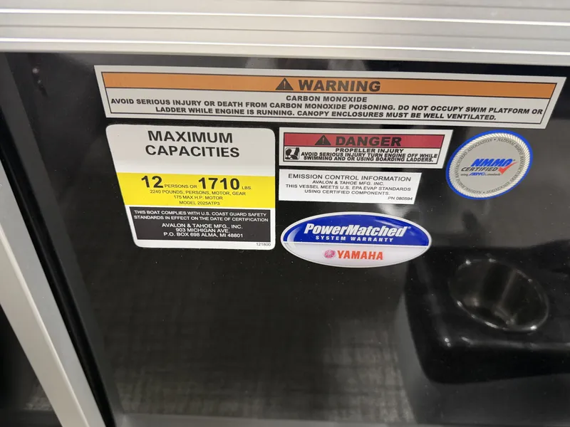 Slide: The Image of Warning labels and capacity details on Avalon VNT VRB21T boat, year 2026. - 17