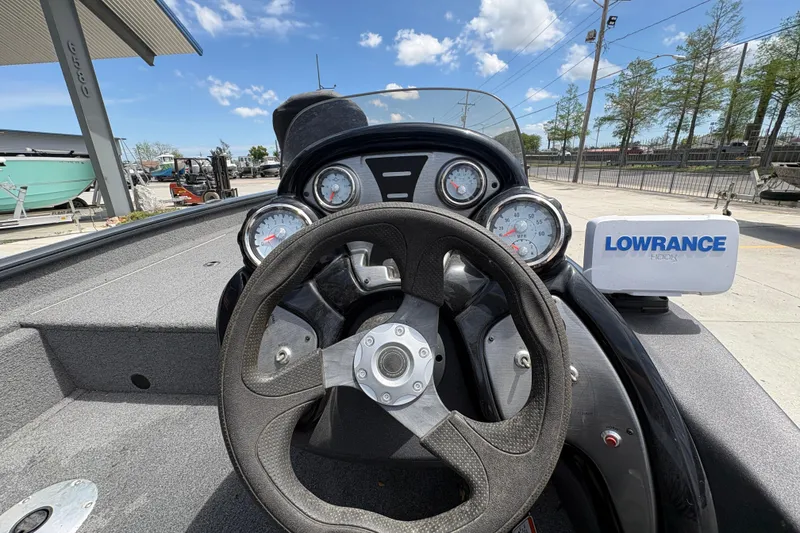 Slide: The Image of Steering console of 2022 Tracker Pro Team 175 boat with Lowrance Hook display. - 15