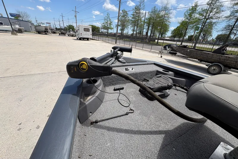 Slide: The Image of 2022 Tracker Pro Team 175 boat with trolling motor in outdoor setting. - 21