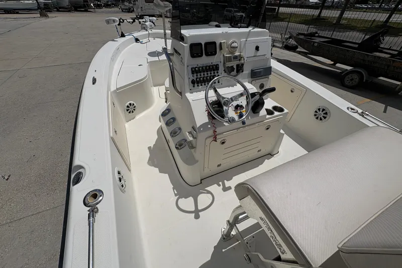 Slide: The Image of 2008 Hydra-Sports Bay Bolt 23 boat interior with steering console and seating. - 13