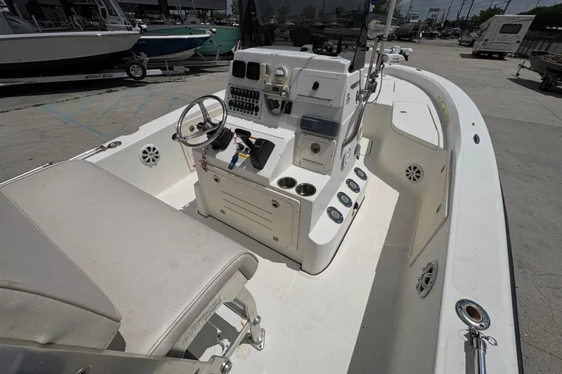 Slide: The Image of 2008 Hydra-Sports Bay Bolt 23 boat interior with steering console and seating. - 14