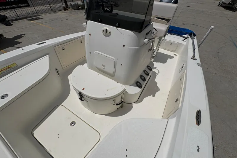 Slide: The Image of 2008 Hydra-Sports Bay Bolt 23 boat interior with seating and storage compartments. - 18