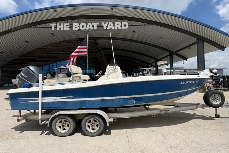 Slide: The Image of 2008 Hydra-Sports Bay Bolt 23 boat on trailer at The Boat Yard, featuring Yamaha engine. - 2