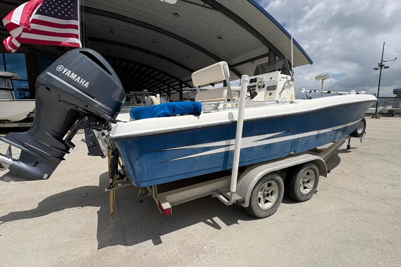 Slide: The Image of 2008 Hydra-Sports Bay Bolt 23 boat on trailer with Yamaha engine, parked outdoors. - 3