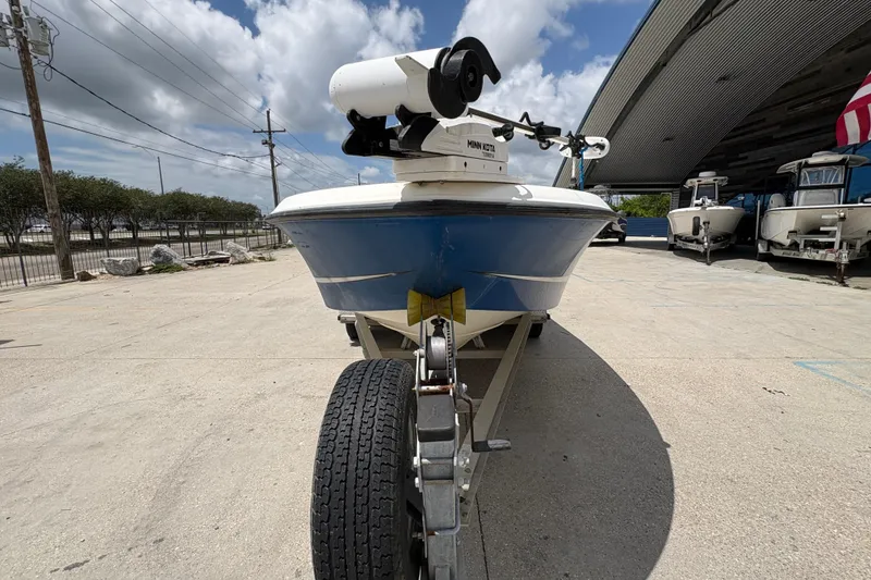 Slide: The Image of 2008 Hydra-Sports Bay Bolt 23 boat on trailer, parked outdoors under cloudy sky. - 8