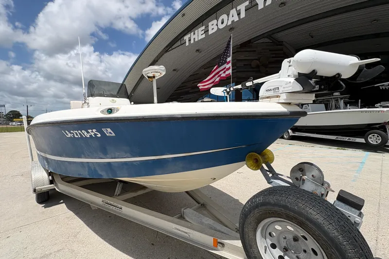 Slide: The Image of 2008 Hydra-Sports Bay Bolt 23 boat on trailer, parked outside a marina. - 9