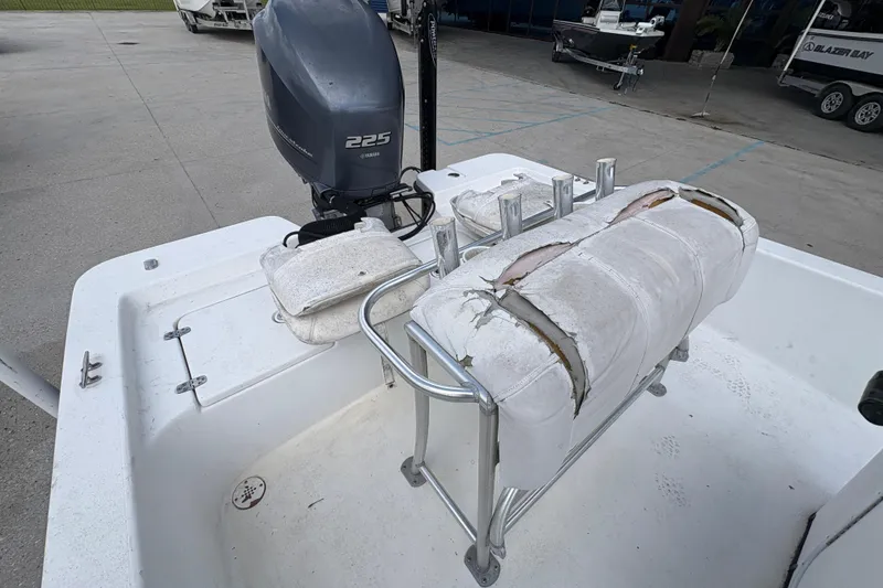 Slide: The Image of Blazer Bay 2020 boat with Yamaha 225 engine, worn seating, and rod holders. - 14