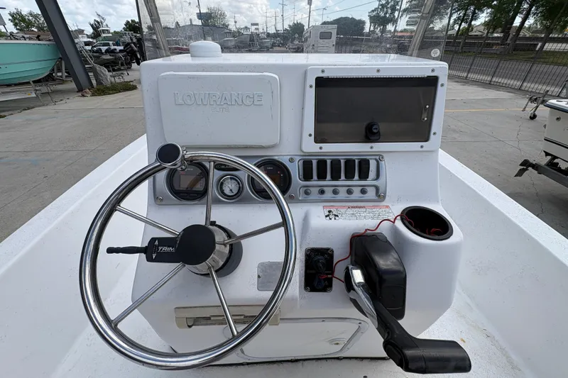 Slide: The Image of Steering console of a 2010 Blazer Bay 2020 boat with Lowrance Elite system. - 15