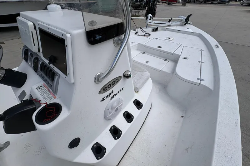 Slide: The Image of Blazer Bay 2020 boat interior, featuring control panel and seating, 2010 model. - 17