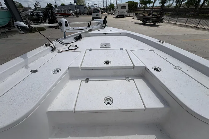 Slide: The Image of Blazer Bay 2020 boat deck, 2010 model, featuring storage compartments and fishing equipment. - 18