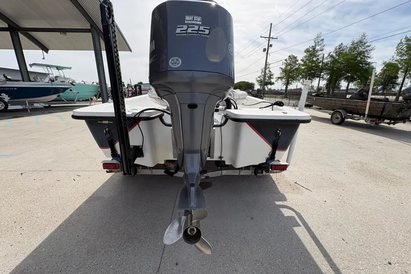 Slide: The Image of Rear view of a 2010 Blazer Bay 2020 boat with Yamaha 225 outboard motor. - 5