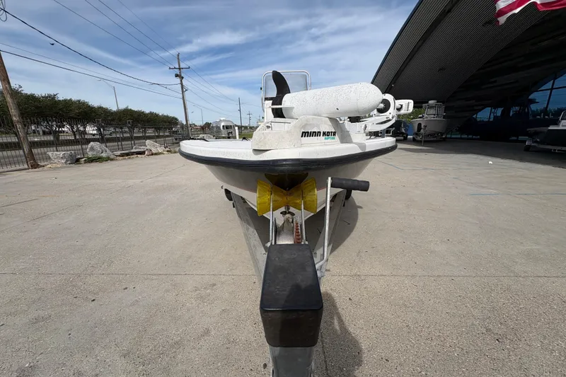Slide: The Image of Blazer Bay 2020 boat from 2010 with Minn Kota trolling motor on trailer. - 9