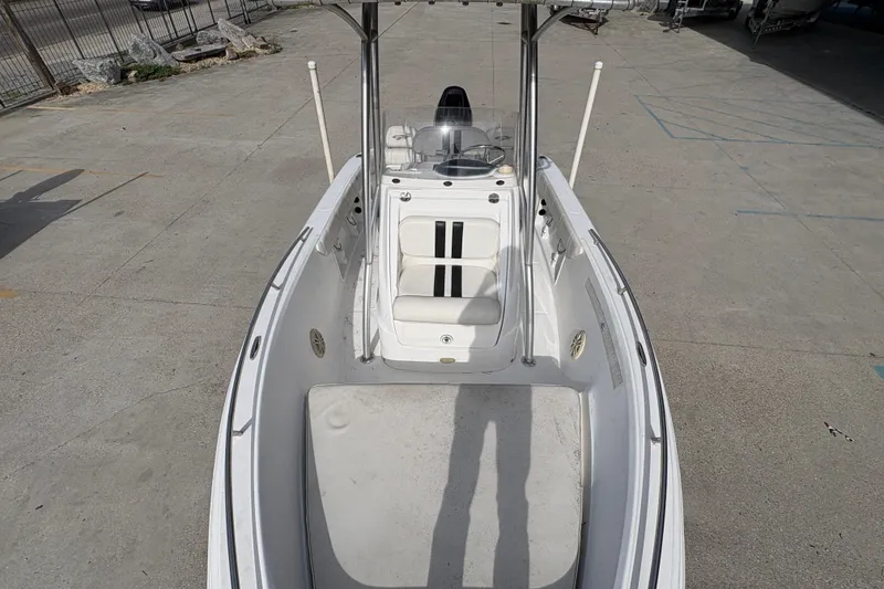 Slide: The Image of 2014 Glasstream 192 CC boat, white interior, parked on concrete surface. - 15