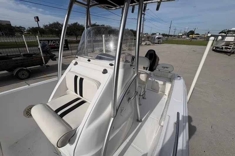 Slide: The Image of 2014 Glasstream 192 CC boat with center console and seating, parked outdoors. - 18