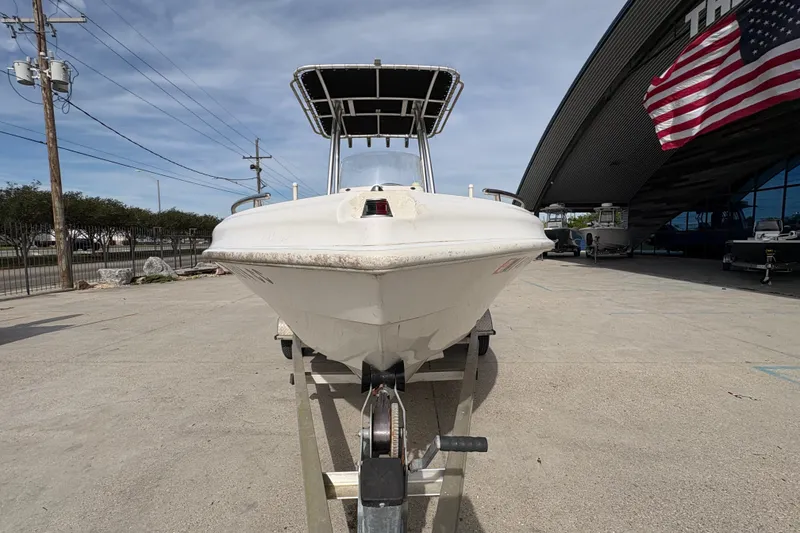 Slide: The Image of 2014 Glasstream 192 CC boat on trailer, outdoor display with American flag. - 9