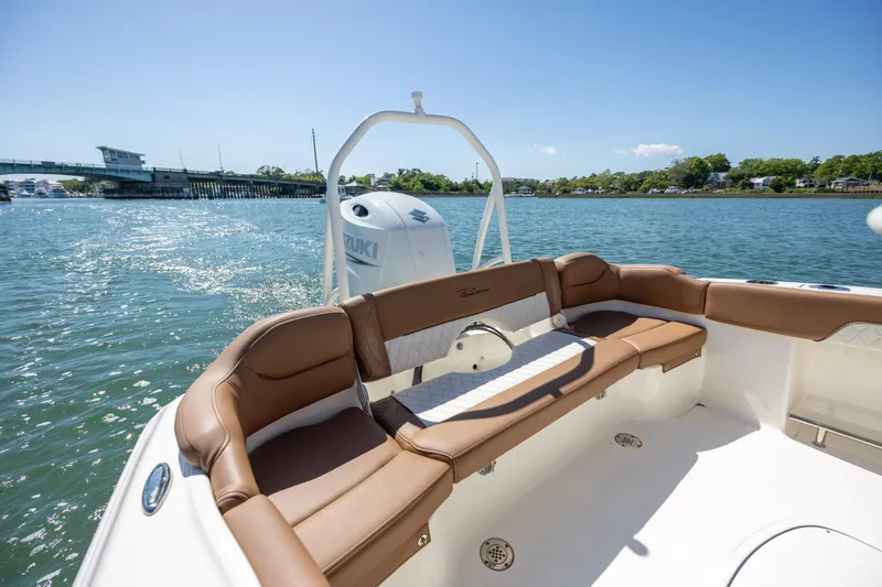 Slide: The Image of 2022 Pioneer 202 Islander boat with Suzuki engine on a sunny day. - 17