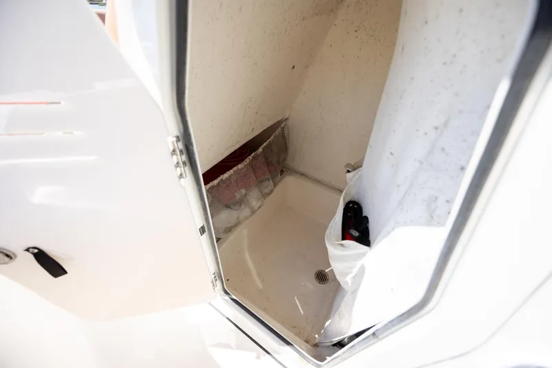 Slide: The Image of Interior view of a 2022 Pioneer 202 Islander boat compartment. - 24