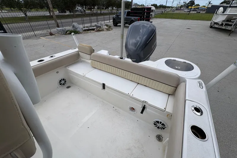 Slide: The Image of 2015 Sea Fox 249 Avenger boat interior with seating and Yamaha outboard motor. - 10