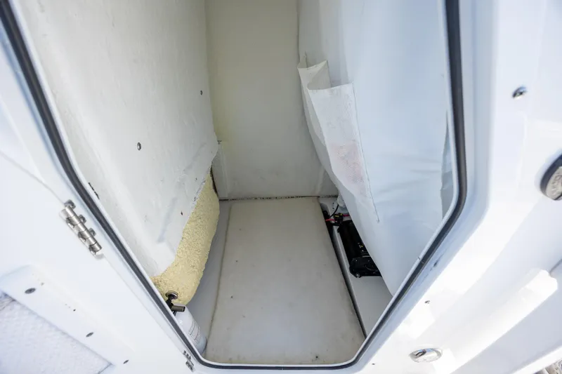 Slide: The Image of Interior storage compartment of 2024 Sea Hunt Ultra 234 boat. - 38