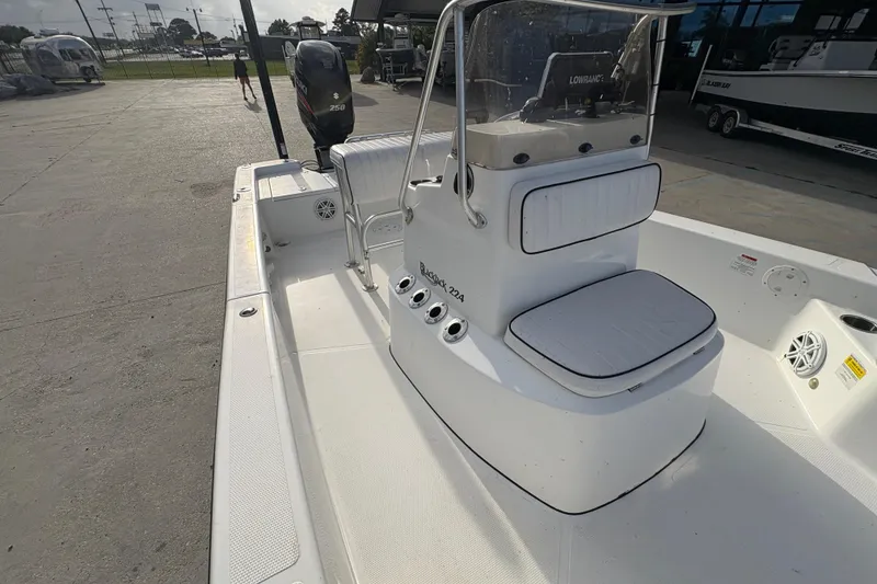 Slide: The Image of 2012 BlackJack 224 boat with center console and Suzuki 250 outboard motor. - 14