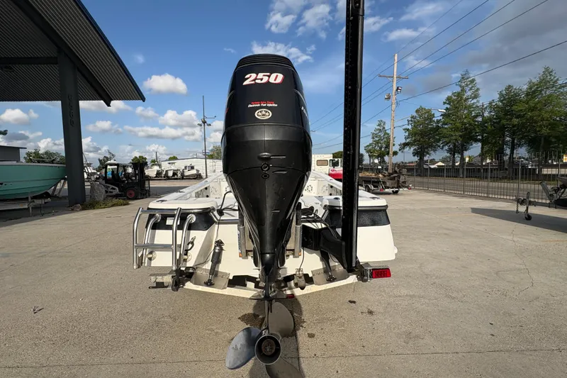 Slide: The Image of Rear view of a 2012 BlackJack 224 boat with a 250 HP outboard motor. - 5