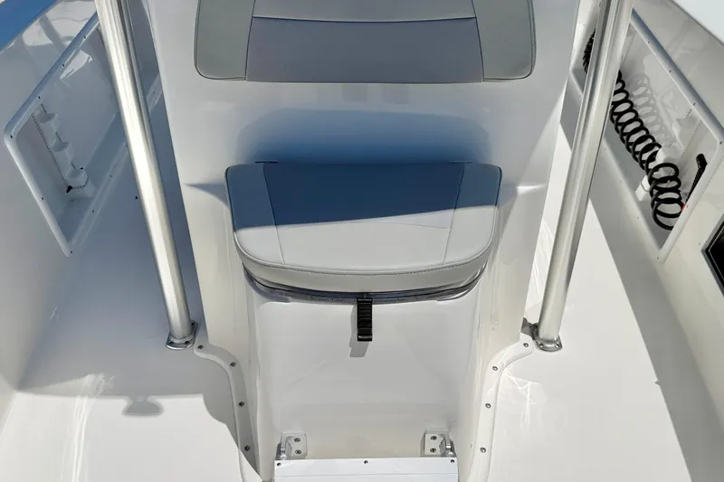 Slide: The Image of 2026 Bay Rider 21 Offshore boat interior with cushioned seat and sleek design. - 12