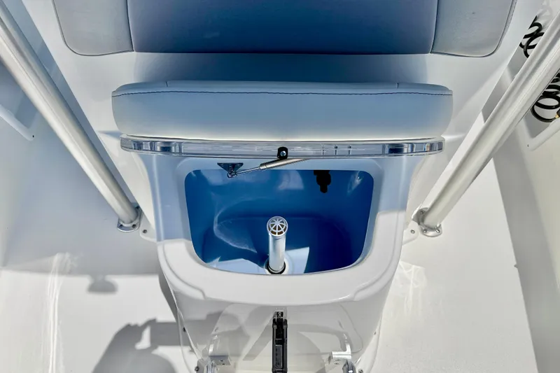 Slide: The Image of Bay Rider 21 Offshore 2026 boat interior with seating and storage compartment. - 13