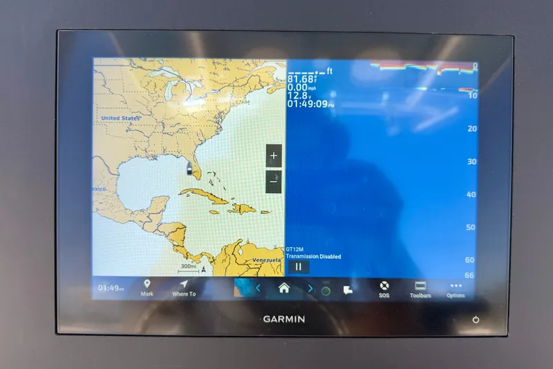 Slide: The Image of Garmin marine GPS display on 2026 Bay Rider 21 Offshore boat, showing navigation map. - 16