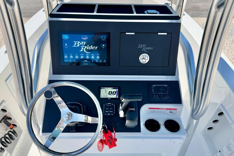 Slide: The Image of Bay Rider 21 Offshore 2026 boat console with steering wheel and digital display. - 22