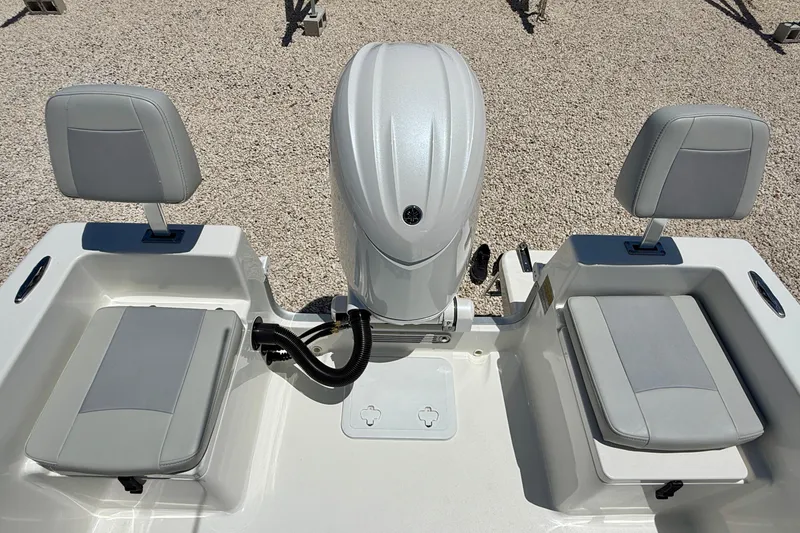 Slide: The Image of 2026 Bay Rider 21 Offshore boat with dual seats and outboard motor. - 26