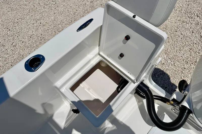 Slide: The Image of Open storage compartment on 2026 Bay Rider 21 Offshore boat, showcasing interior features. - 29