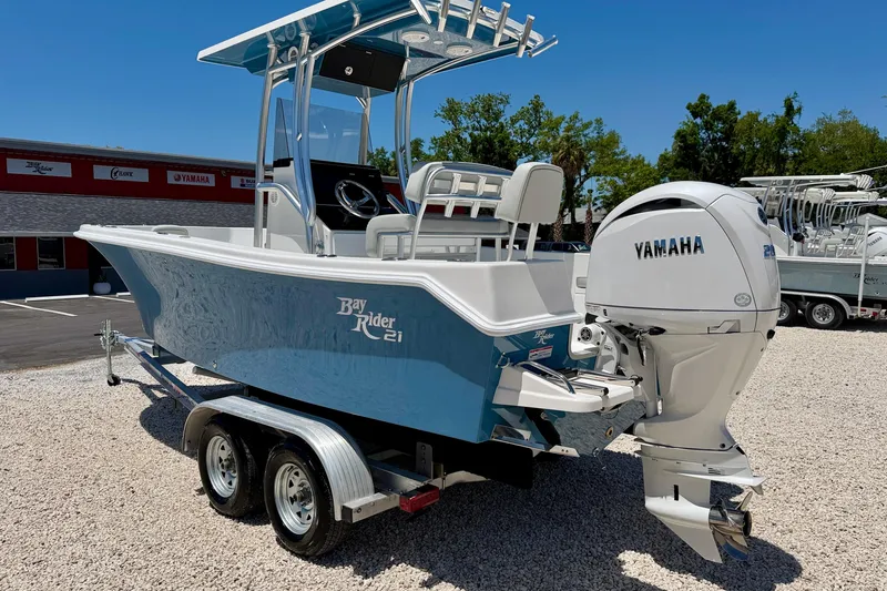 Slide: The Image of 2026 Bay Rider 21 Offshore boat with Yamaha engine on a trailer. - 7