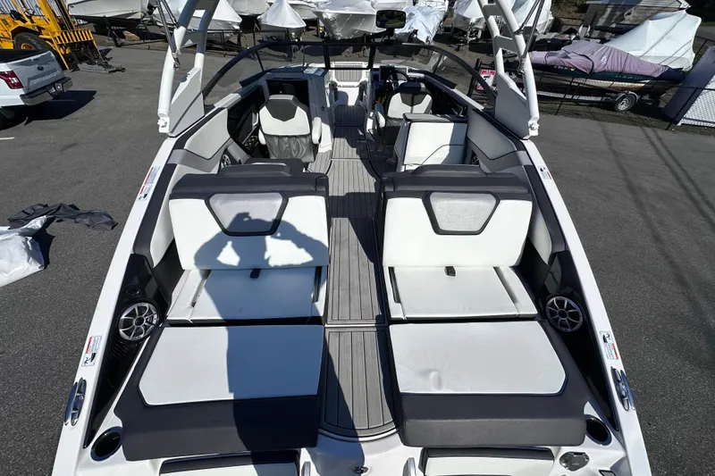 Slide: The Image of 2021 Yamaha Boats 252S interior with spacious seating and modern design. - 11