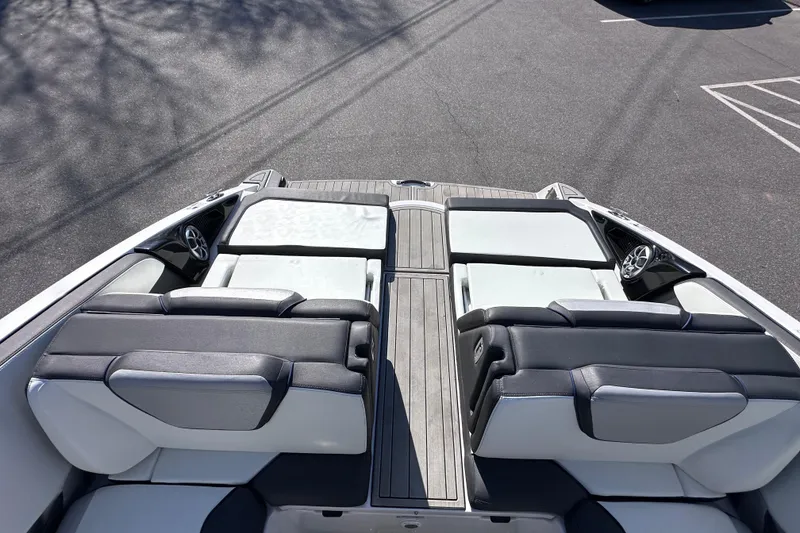 Slide: The Image of 2021 Yamaha Boats 252S interior with sleek seating and modern design. - 15
