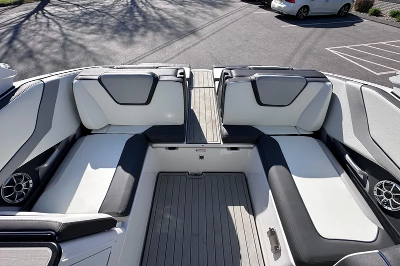 Slide: The Image of 2021 Yamaha Boats 252S interior with sleek seating and modern design. - 16