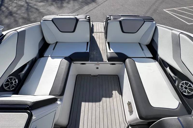 Slide: The Image of 2021 Yamaha Boats 252S interior with sleek seating and modern design. - 17
