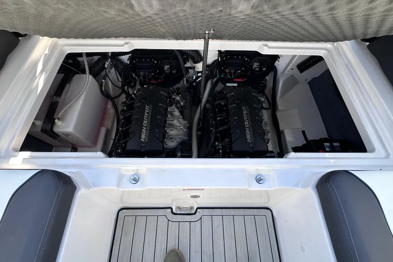 Slide: The Image of 2021 Yamaha Boats 252S engine compartment with dual high-output engines. - 19