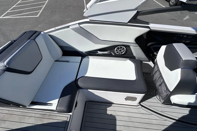 Slide: The Image of 2021 Yamaha Boats 252S interior with sleek seating and modern design. - 27