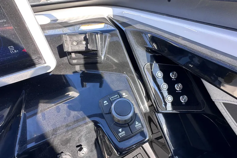 Slide: The Image of Control panel of 2021 Yamaha Boats 252S, featuring buttons and navigation controls. - 36