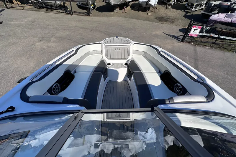 Slide: The Image of 2021 Yamaha Boats 252S interior with spacious seating and sleek design. - 40