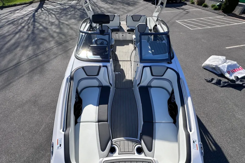 Slide: The Image of 2021 Yamaha Boats 252S interior view, showcasing sleek seating and modern design. - 46